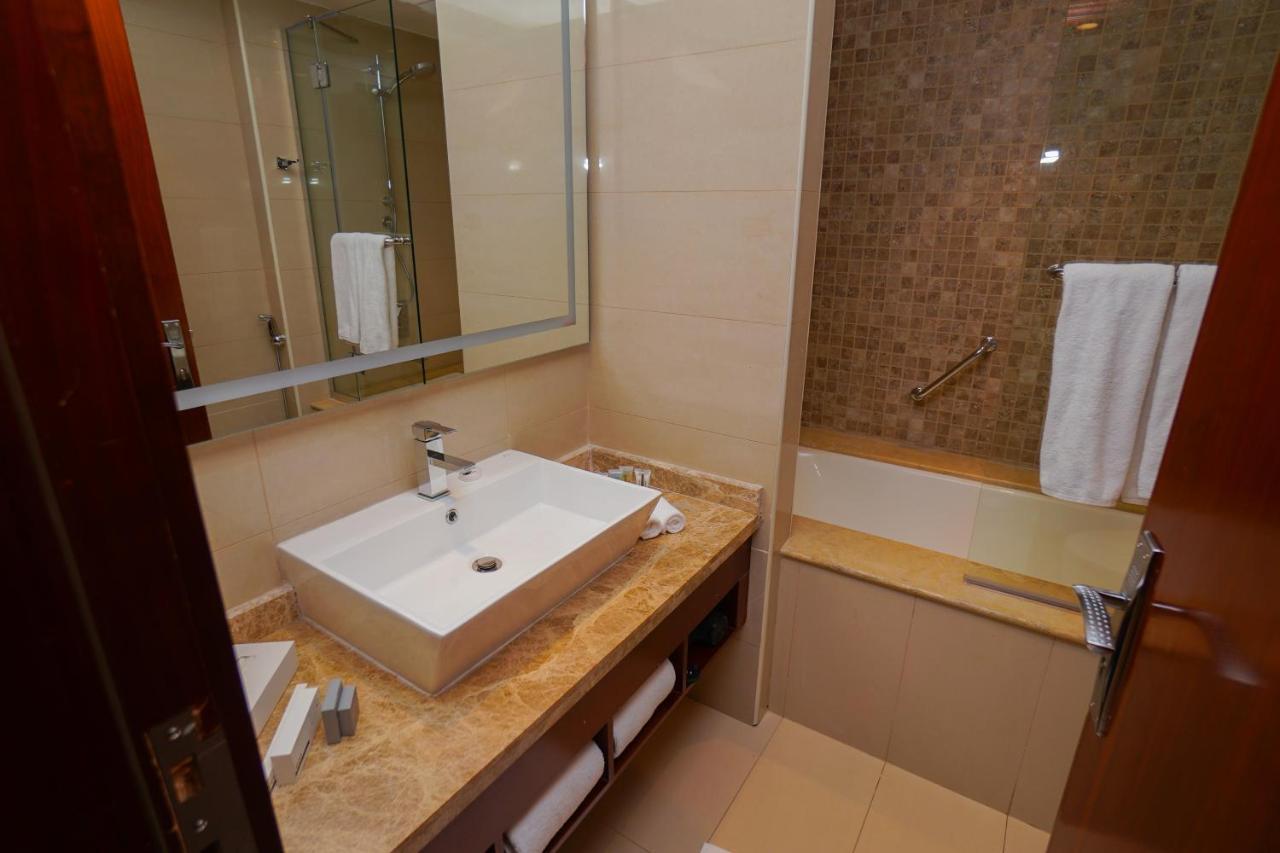 The Grand Lux Hotel Doha Exterior foto Bathroom